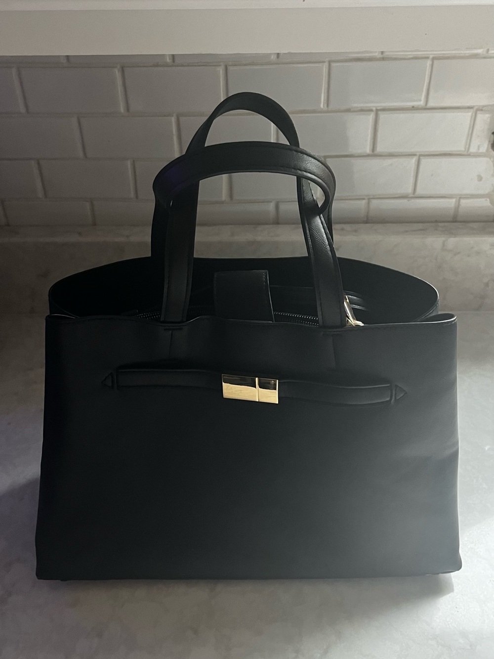 Black Structured Handbag with Gold Accent